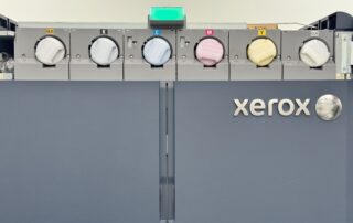 Presse Xerox Iridesse et ses toners or et transparent